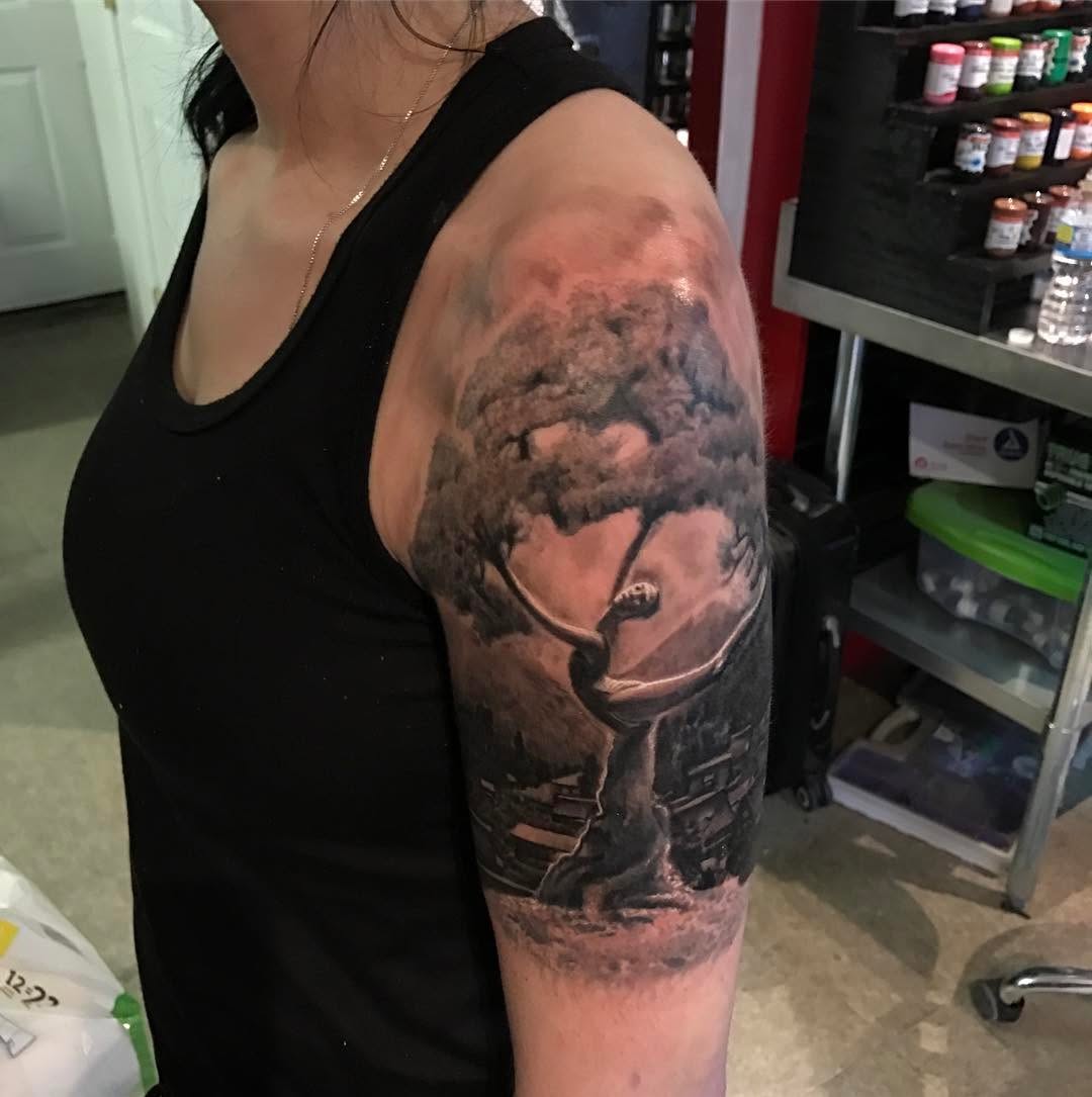 Black-and-grey tree scene, half-sleeve