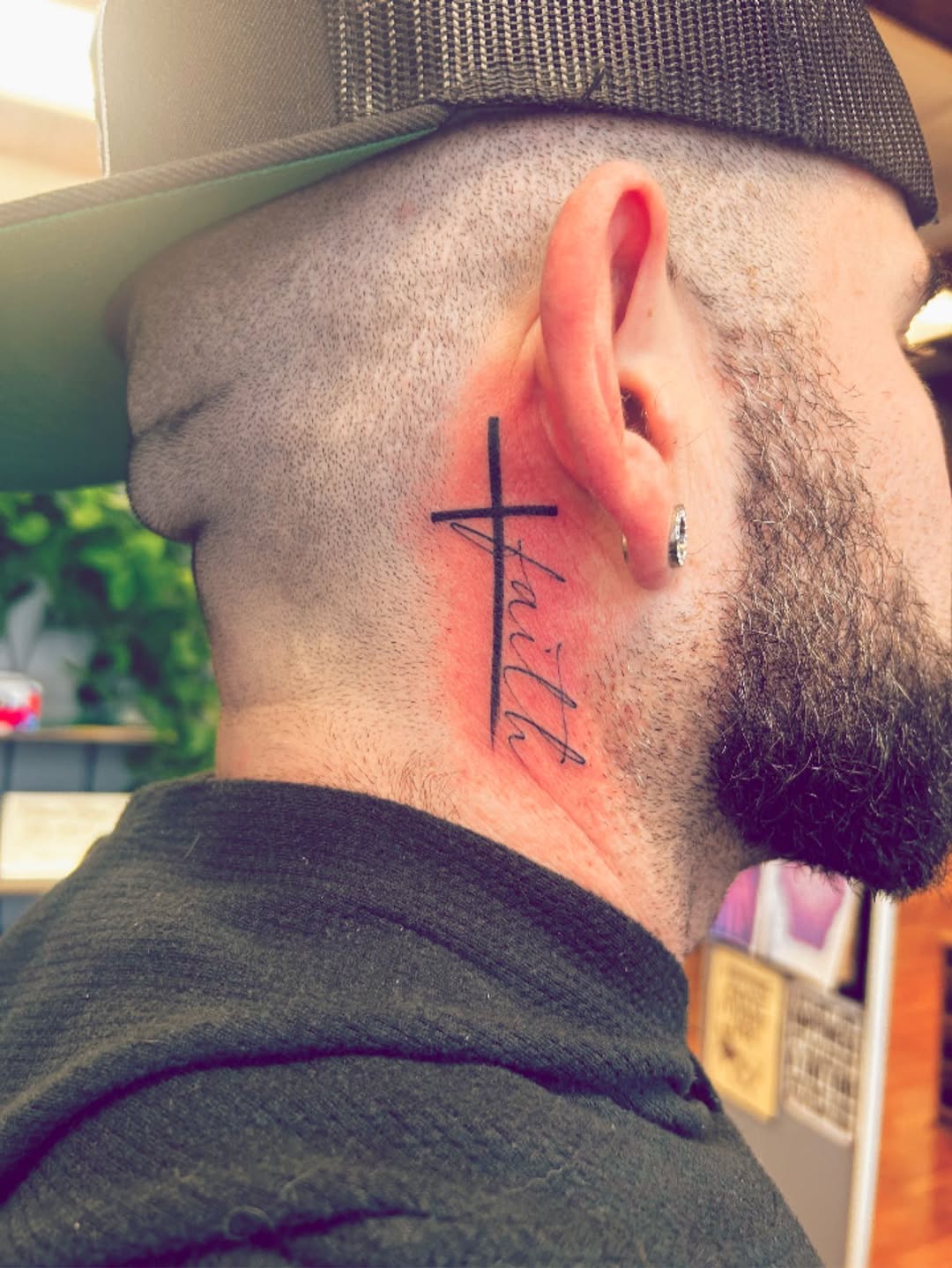 Fine-line 'Faith' cross lettering behind ear