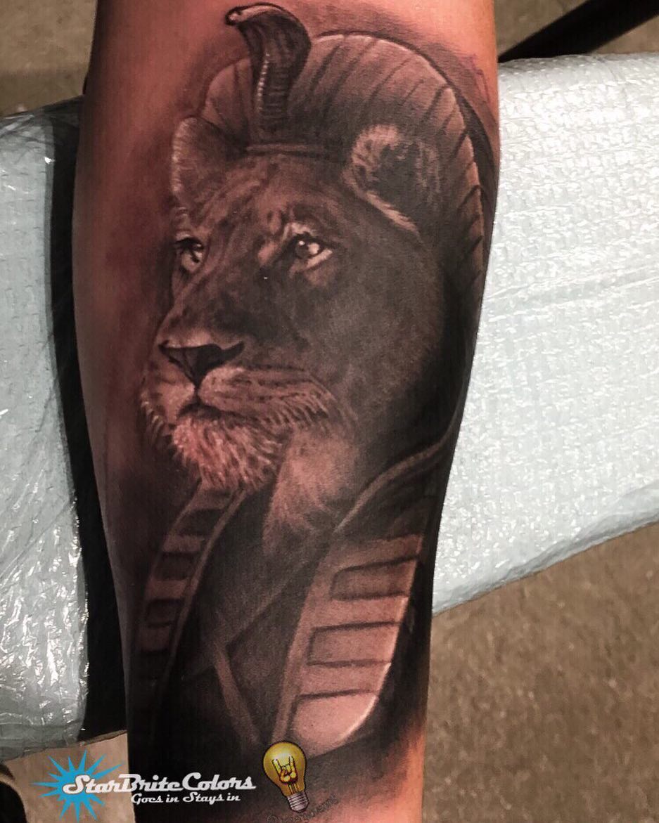 Maahes Egyptian lion god realism tattoo, forearm