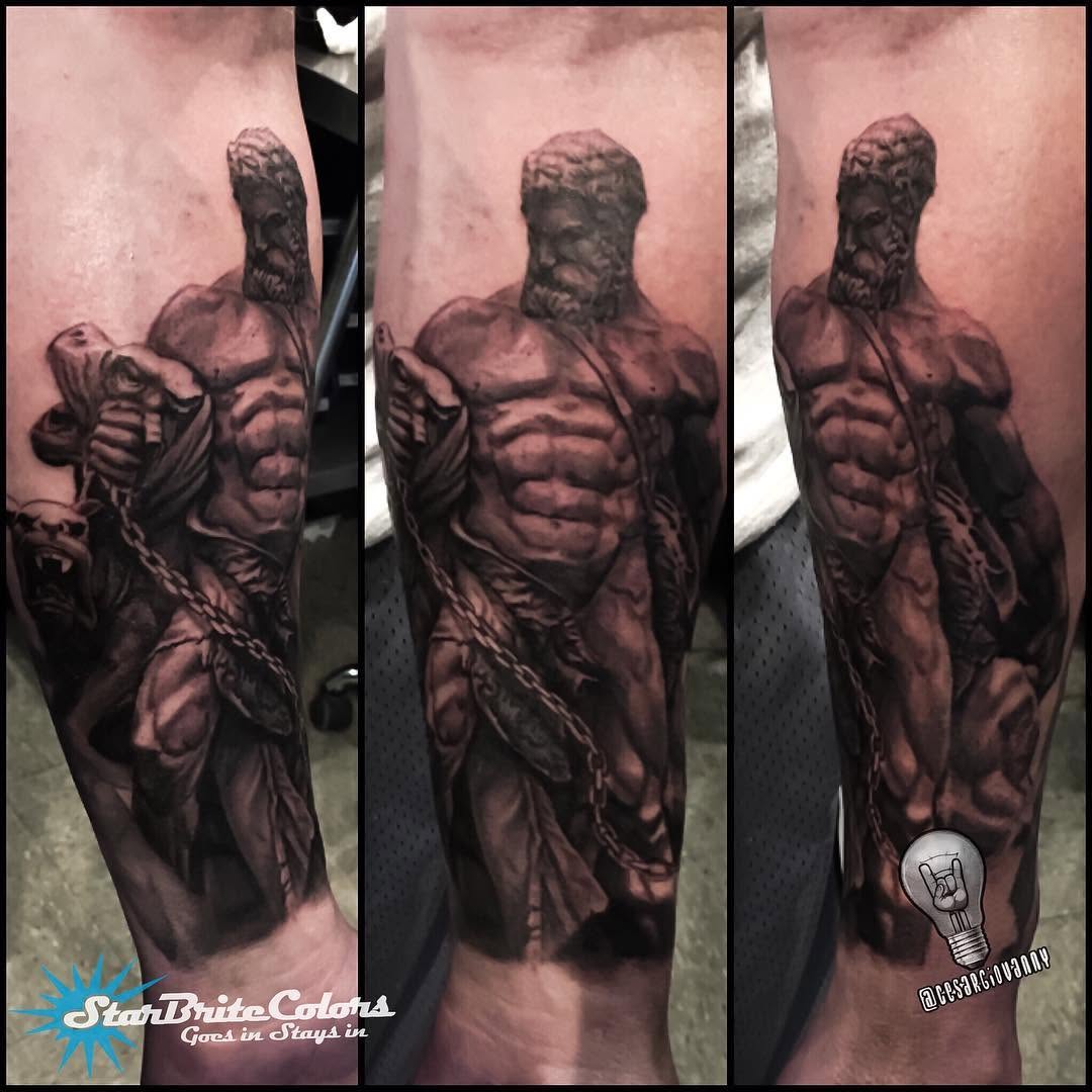Hercules statue realism tattoo, forearm