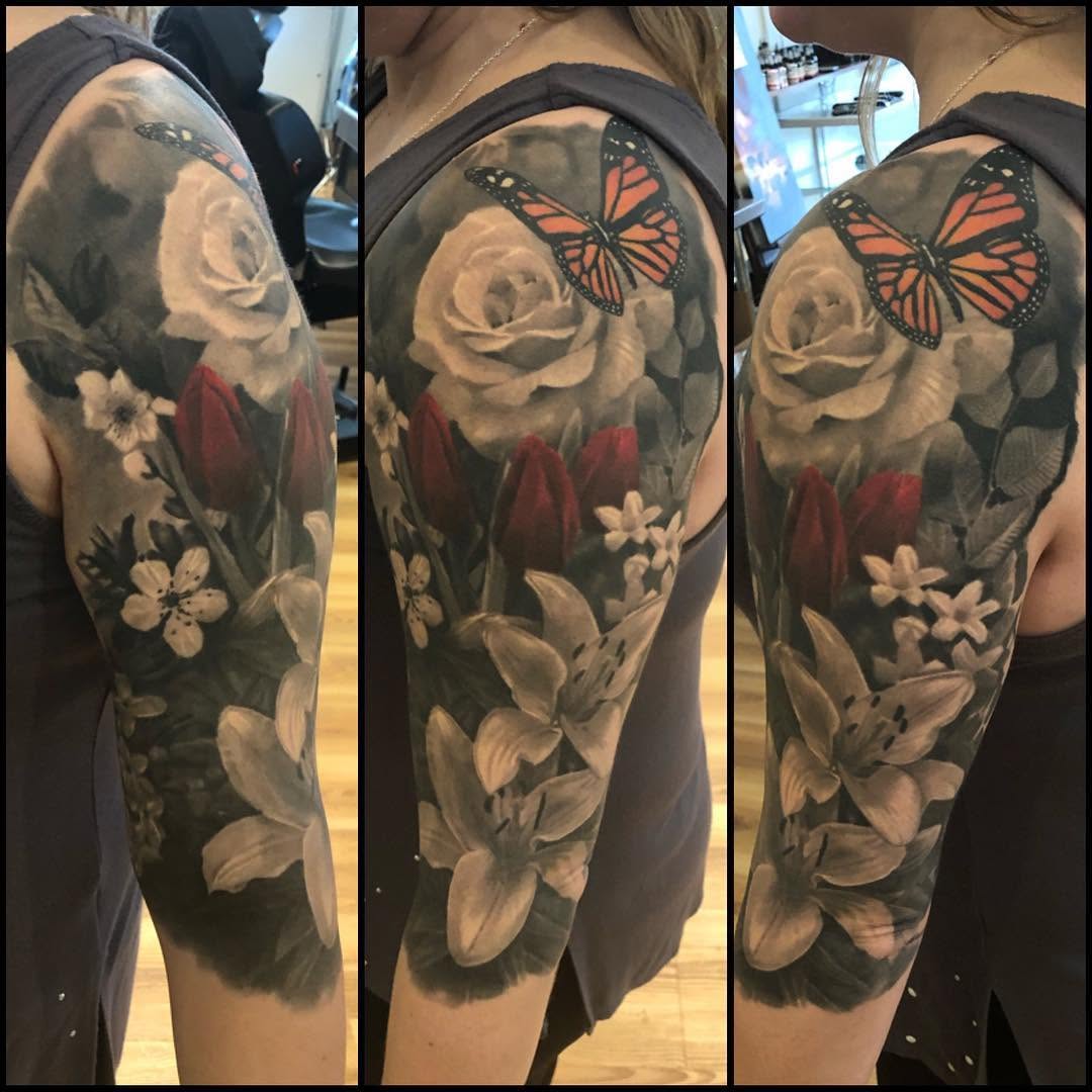 Floral half-sleeve with monarch butterfly, healed