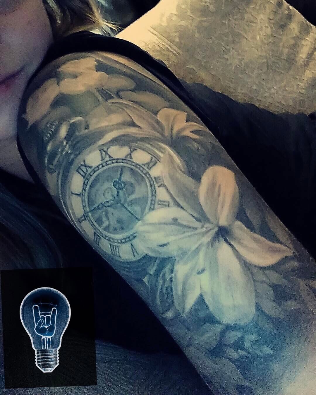 Black-and-grey pocket watch and lily sleeve