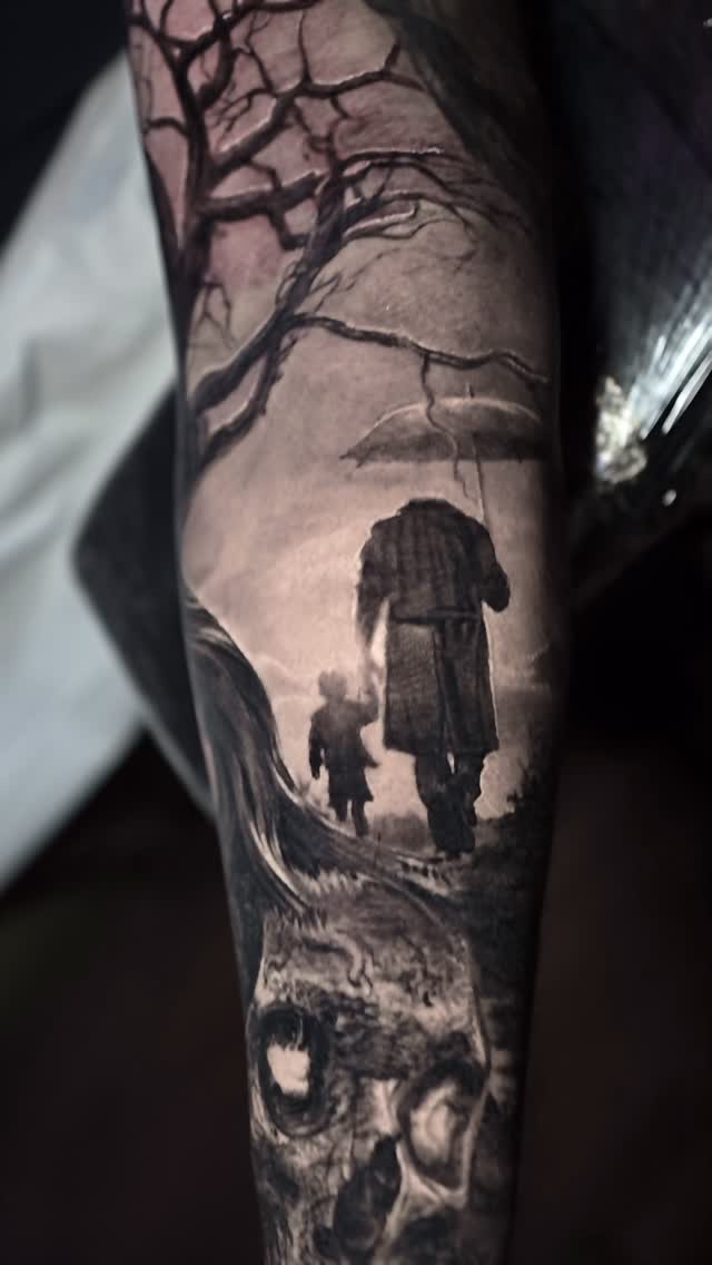 Black-and-grey surreal sleeve, headless figure & tree