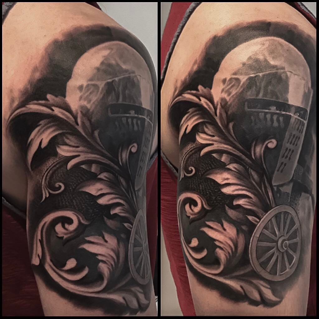 Black-and-grey family crest half-sleeve