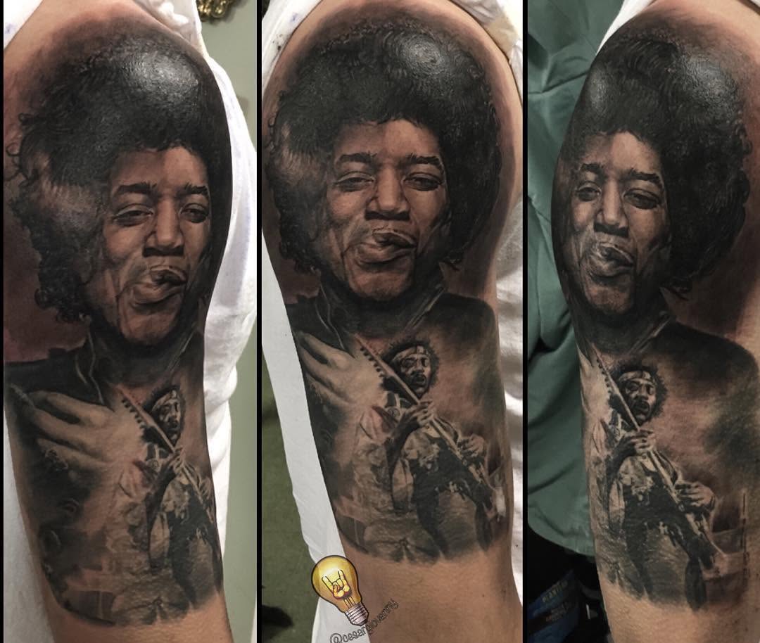 Jimi Hendrix black-and-grey portrait, bicep