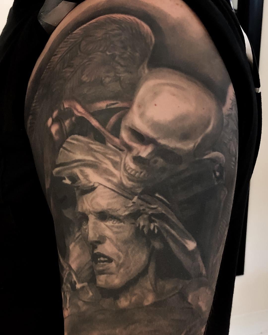 Black-and-grey skull and statue portrait, half-sleeve