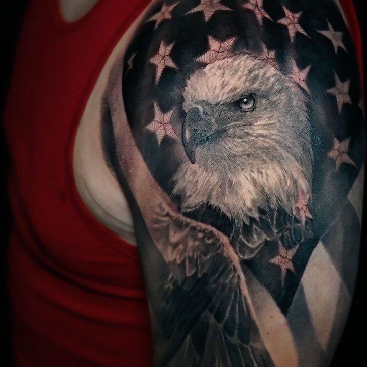 Black-and-grey bald eagle & American flag, arm