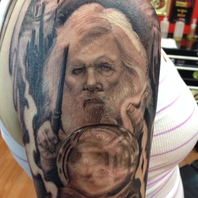 Black-and-grey wizard portrait, half-sleeve