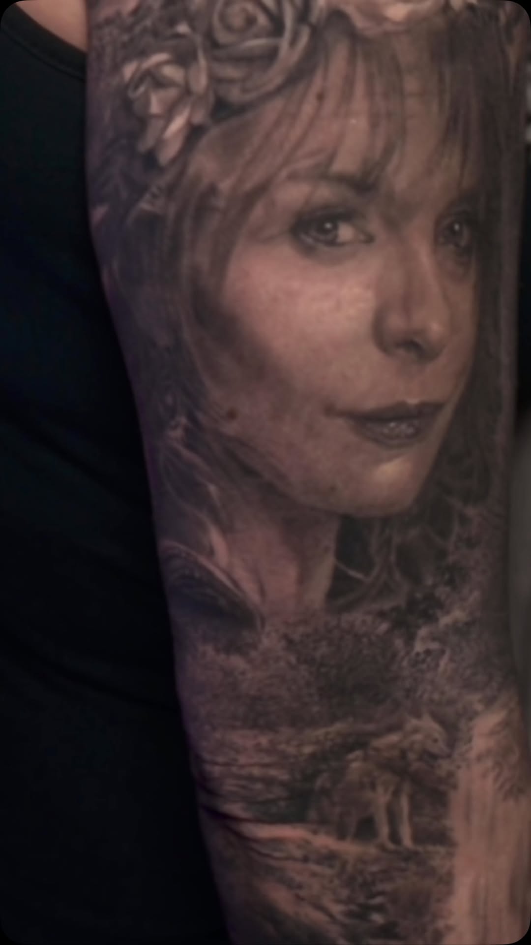 Black-and-grey portrait sleeve with nature scene