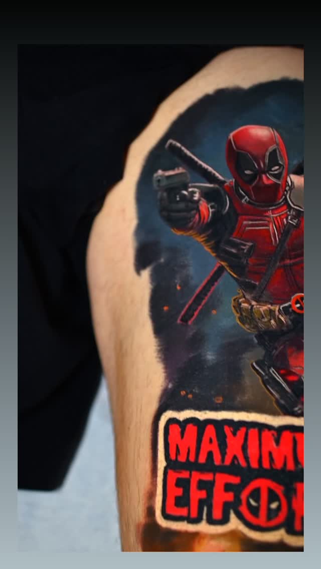 Deadpool color realism tattoo, arm
