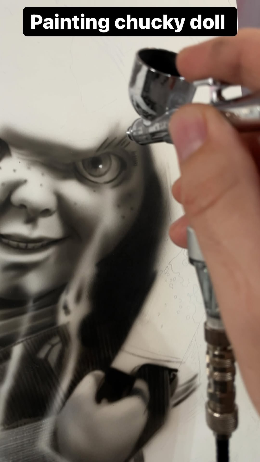 Black-and-grey Chucky doll airbrush painting