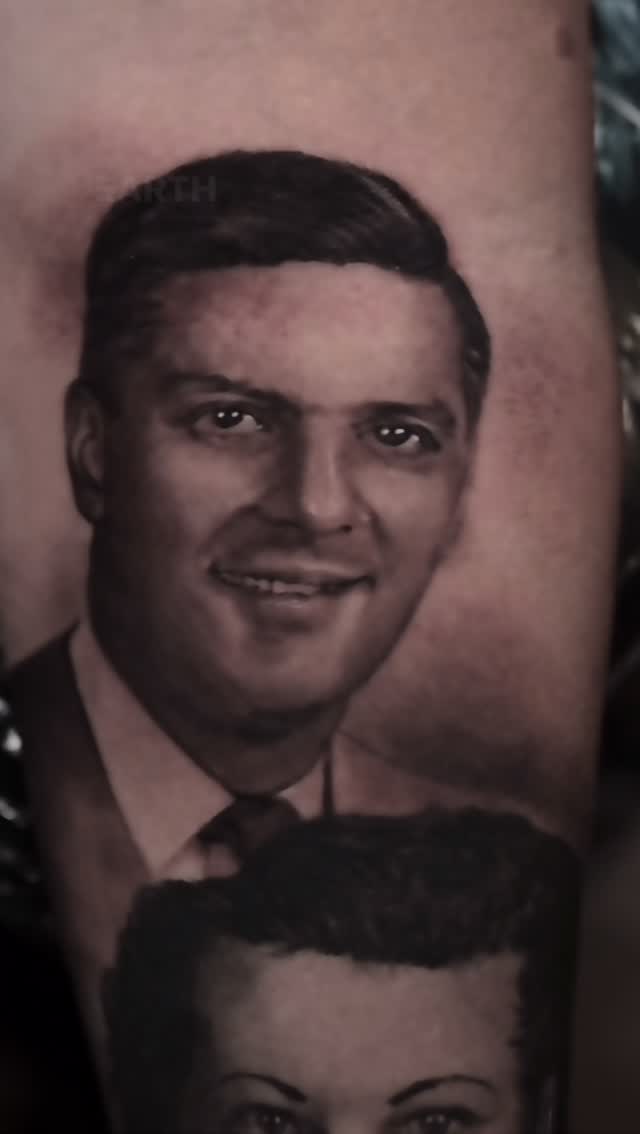 Black-and-grey parents portrait tattoo