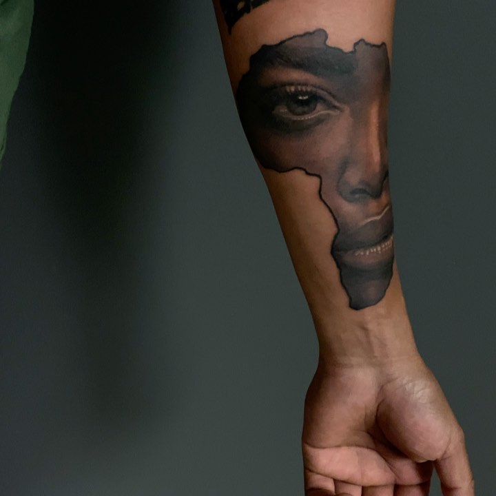 Black-and-grey African princess portrait, forearm