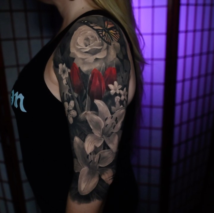 Floral half-sleeve with red tulips and butterfly