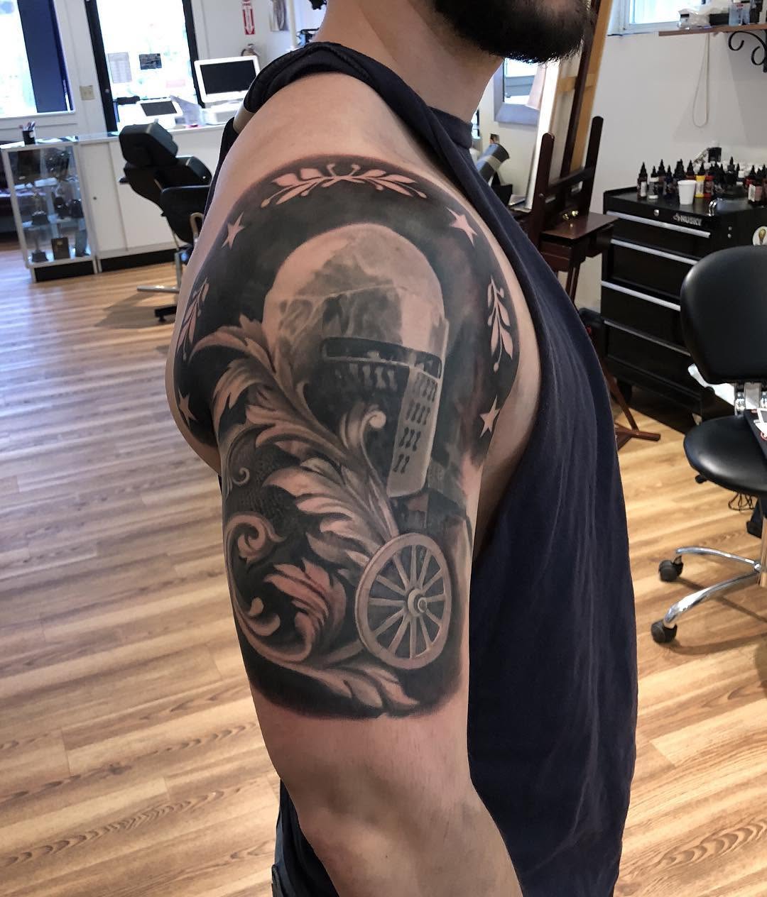 Black-and-grey knight family crest, half-sleeve