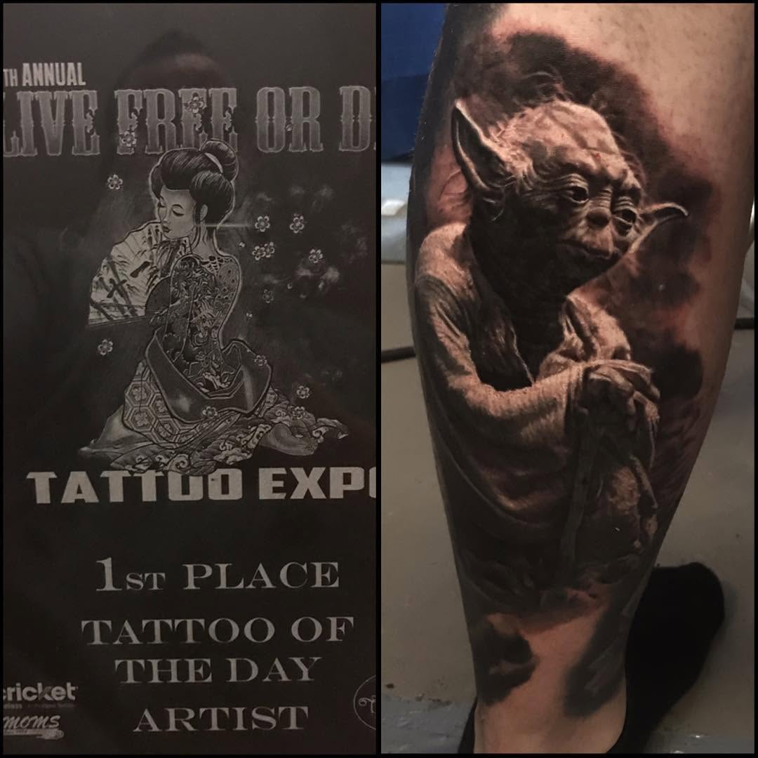 Black-and-grey Yoda portrait on calf
