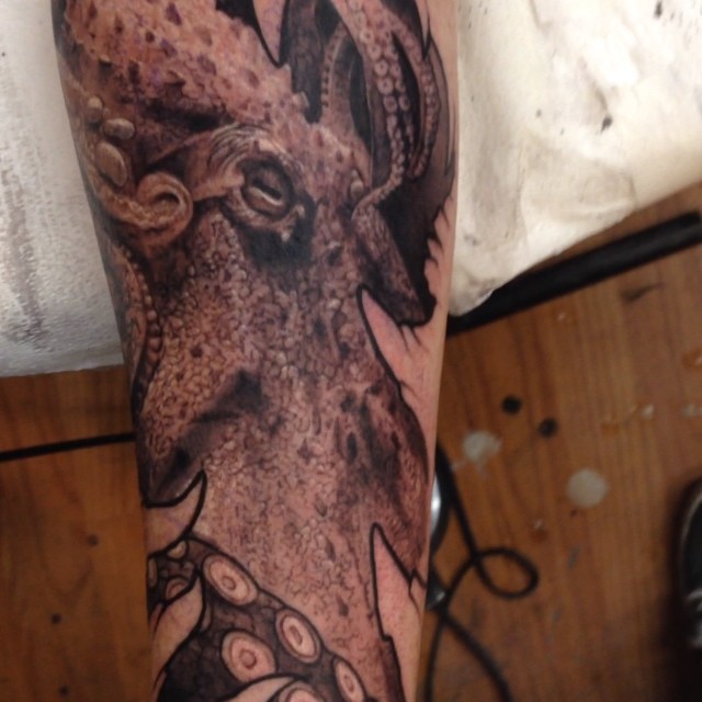 Black-and-grey octopus and skull, forearm