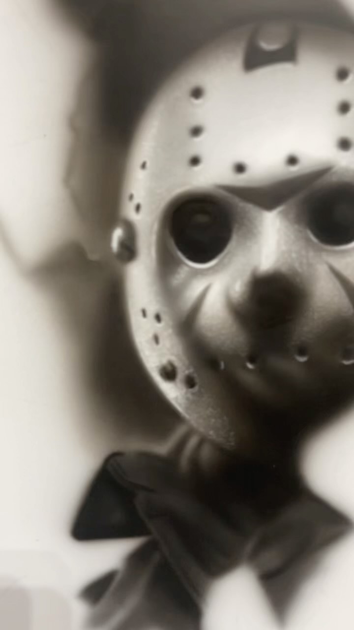 Black-and-grey Jason Voorhees airbrush painting