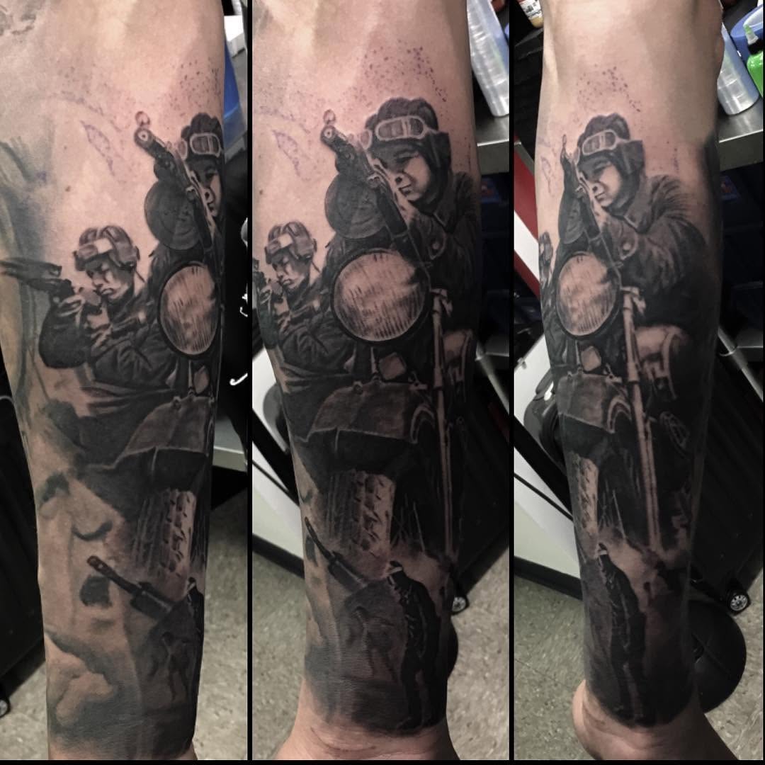 Black-and-grey WWII soldiers sleeve, forearm