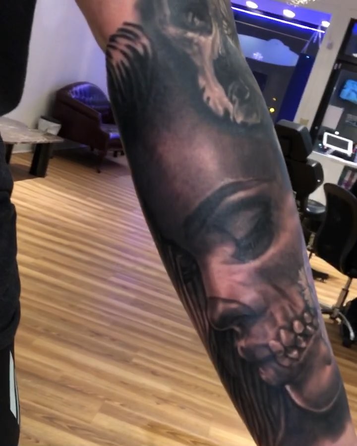 Black-and-grey realism sleeve, forearm