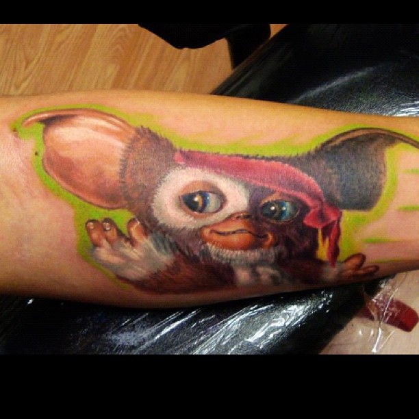 Color realism Gizmo Gremlins tattoo, forearm