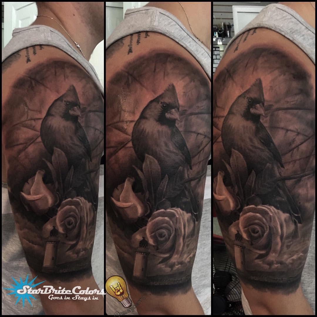 Black-and-grey cardinal and rose half-sleeve