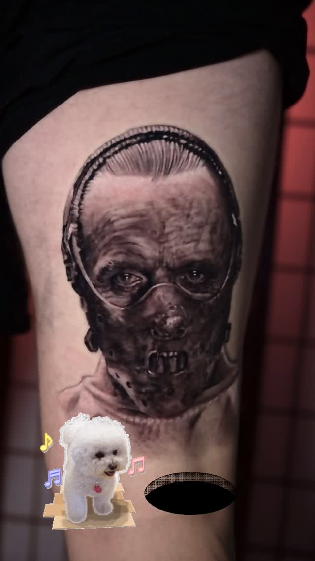 Hannibal Lecter portrait tattoo, thigh