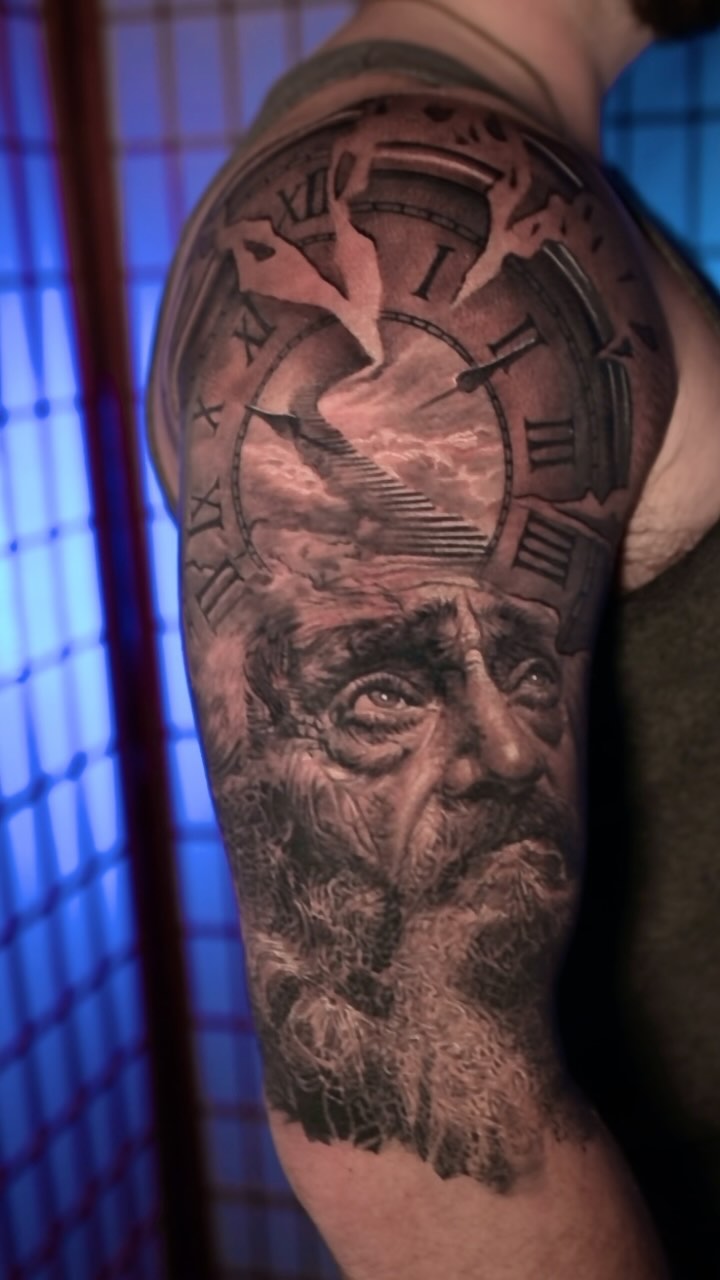 Father Time half sleeve, black-and-grey realism