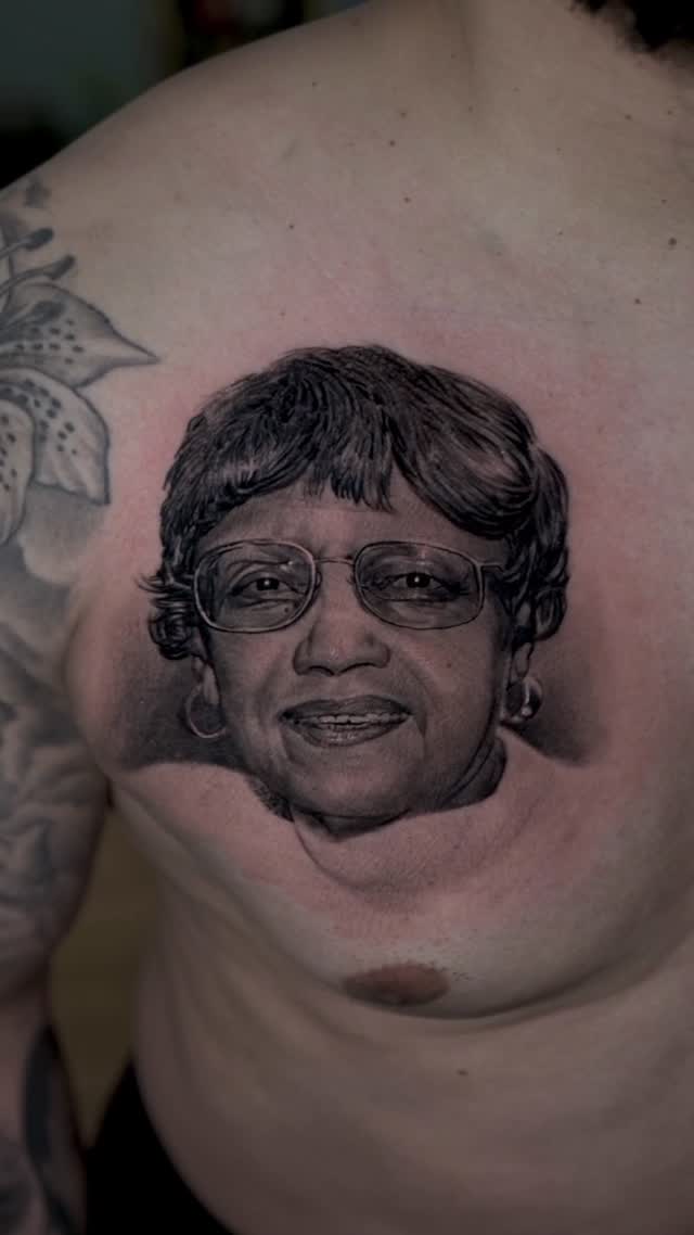 Black-and-grey grandmother portrait, chest