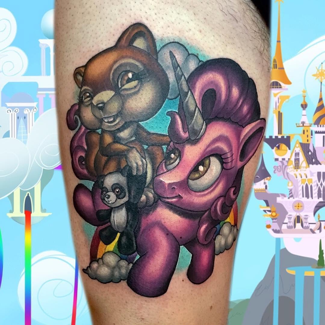 New-school unicorn and squirrel tattoo, thigh