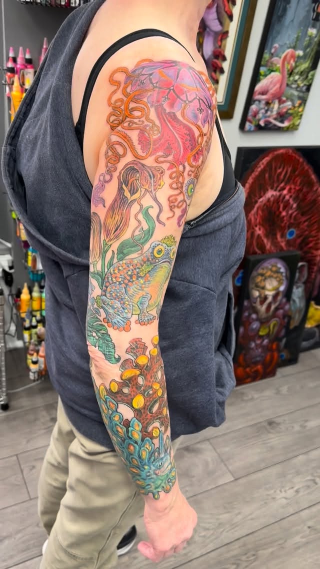 Colorful jellyfish and fish full sleeve tattoo