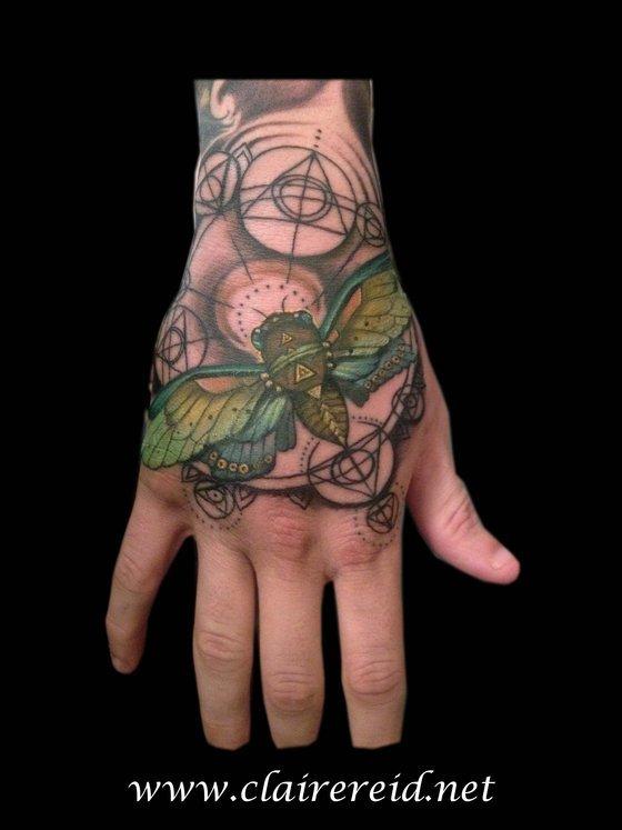 Cicada hand tattoo