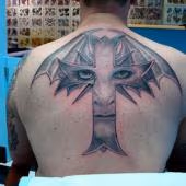 Face in a cross
