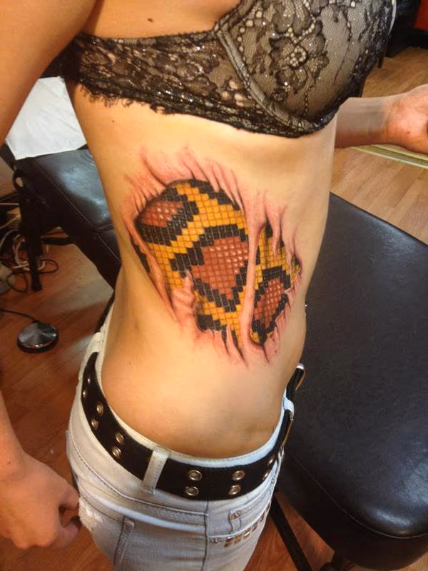 python scales tattoo done by cesar perez ,keene,NH 03431