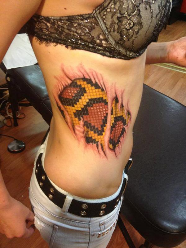 python scales tattoo done by cesar perez ,keene,NH 03431