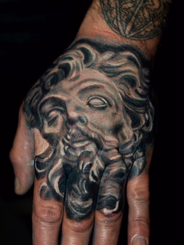 bernini / longinus black and grey hand tattoo