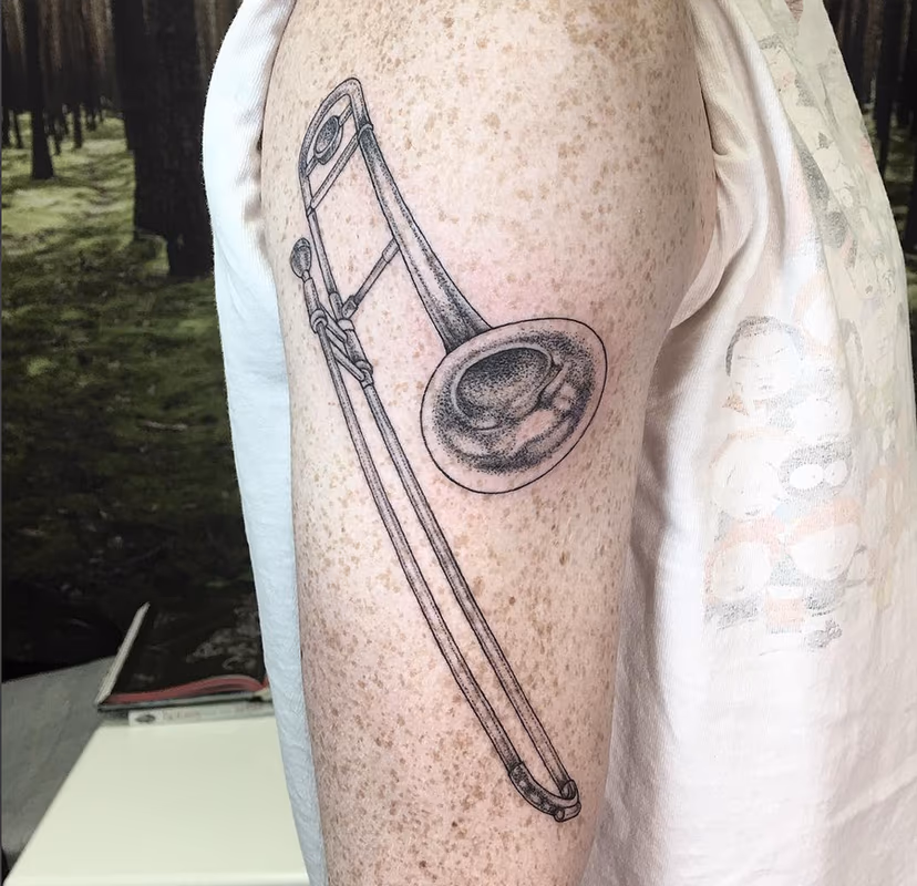 Dotwork Trombone on Arm- Instagram @michaelbalesart
