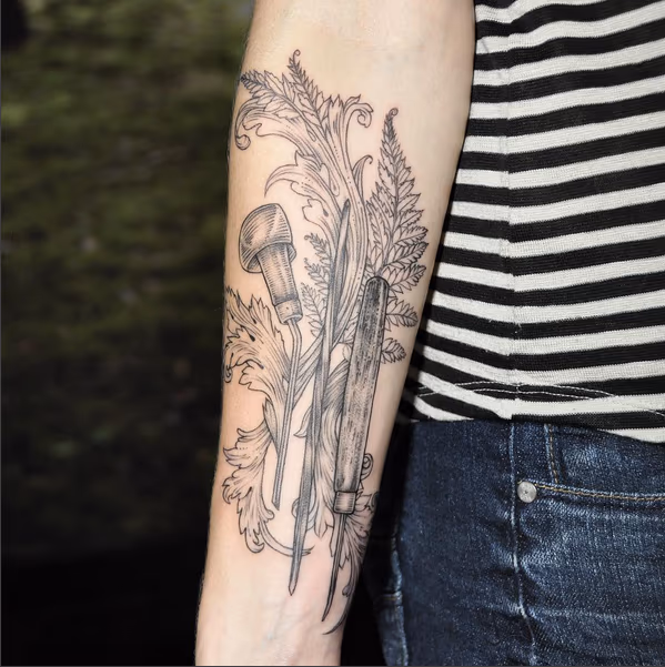Black and Gray Burin (engraving tool) and Scrolls on Forearm-Instagram @micahelbalesart
