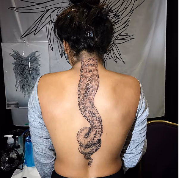 Octopus Tentacle on Spine- Instagram @MichaelBalesArt
