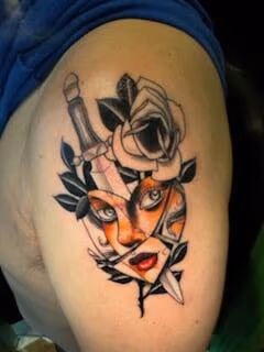 Traditiona dagger and mask tattoo by Slyfox