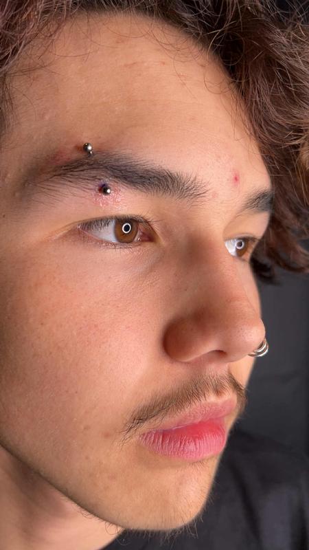 Eyebrow Piercing by Kimber CareBear