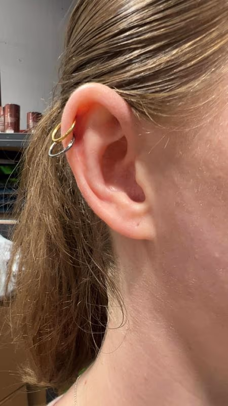 Double helix piercing by Kimber CareBear