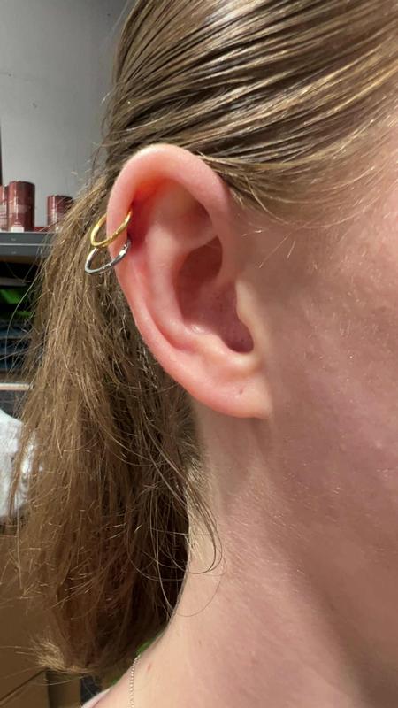Double helix piercing by Kimber CareBear