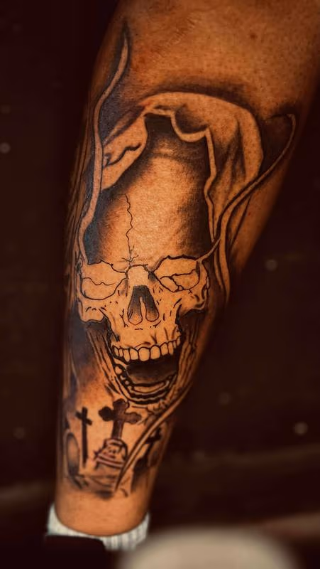 Reaper skull tattoo by Angel Hurtado