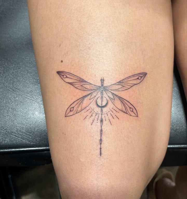 Dragonfly fine line tattoo by Angel
