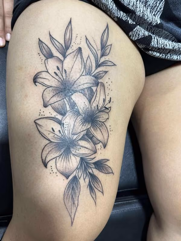 Lily flower tattoo by Angel