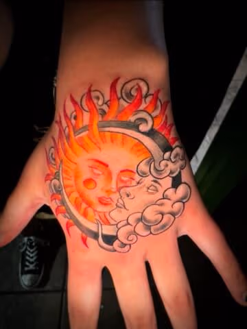 Sun and moon tattoo by SlyFox