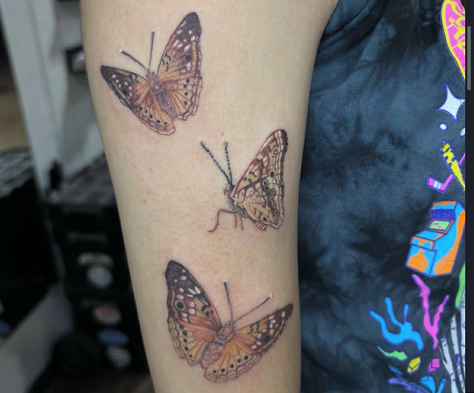 Butterfly tattoo by AlyKAt