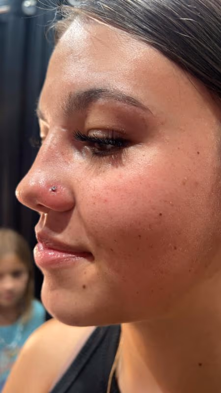 Nostril Piercing by Kimber CareBear
