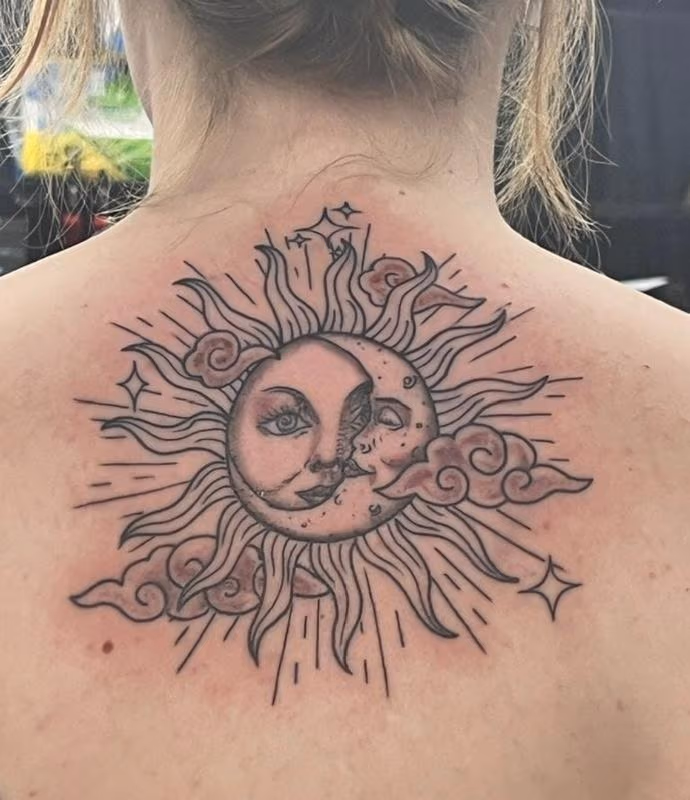 Sun and moon tattoo by Daddy Jack